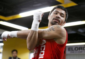 MANILA, PHILIPPINES - SEPTEMBER 30:  Manny Pacquiao in action during a training session on September 30, 2016 in Manila, Philippines.  (Photo by Jeoffrey Maitem/Getty Images)