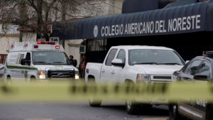 A yellow police line cordons off access to the Colegio Americano del Noreste after a student opened fire at the American school, according to the state's security spokesman, in Monterrey, Mexico January 18, 2017. REUTERS/Daniel Becerril      TPX IMAGES OF THE DAY